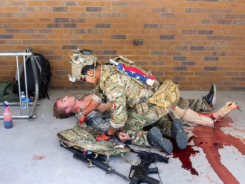 A Soldier with 10th Special Forces Group (Airborne) conducts combat casualty care in a training environment at UCHealth Memorial Hospital Central in Colorado Springs, Colorado, Sept. 22, 2023. To keep their medical certification, Special Forces medical sergeants are required to work at a civilian medical center every three years. (U.S. Army Photo by Staff Sgt. Michael Wood)