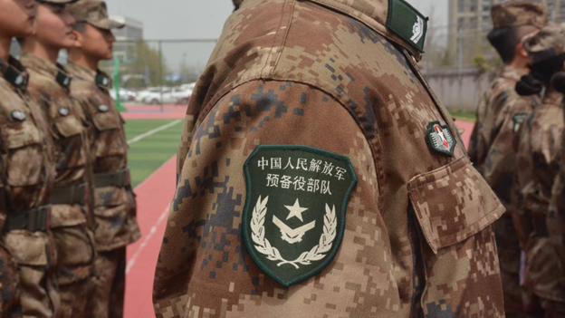 Figure 1: PLA reserve soldiers in formation before new reserve law (with old rank insignia)